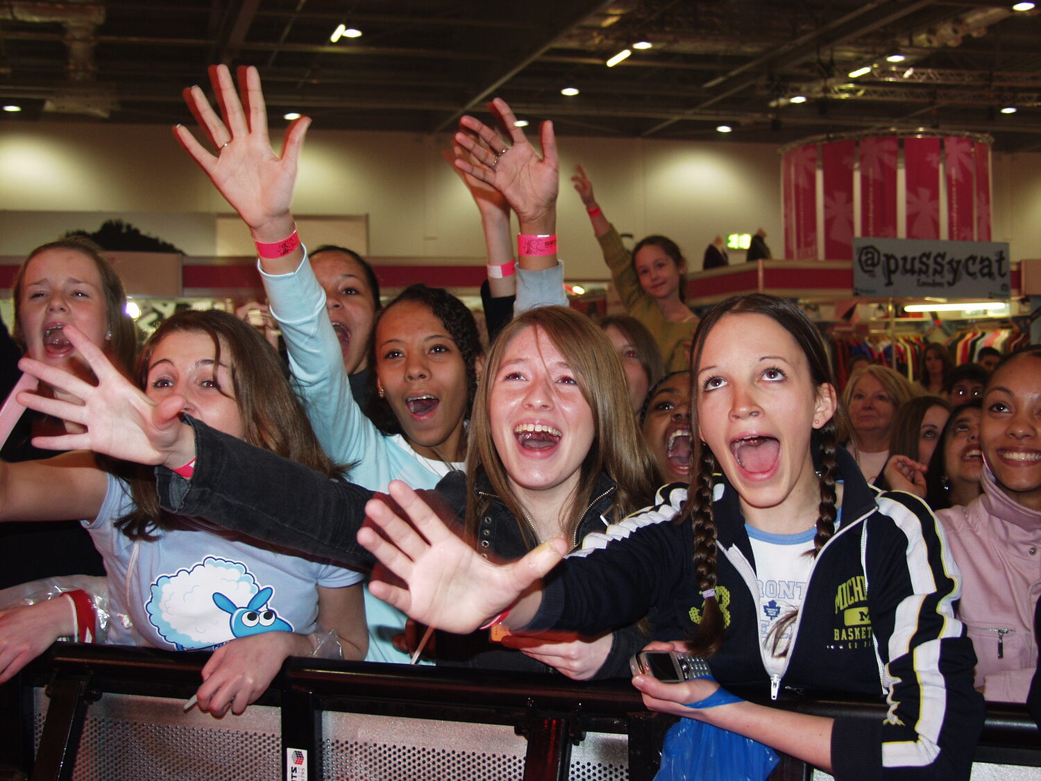 Teenage crowd cheering at the SistaStyle show, ExCeL London, 2004